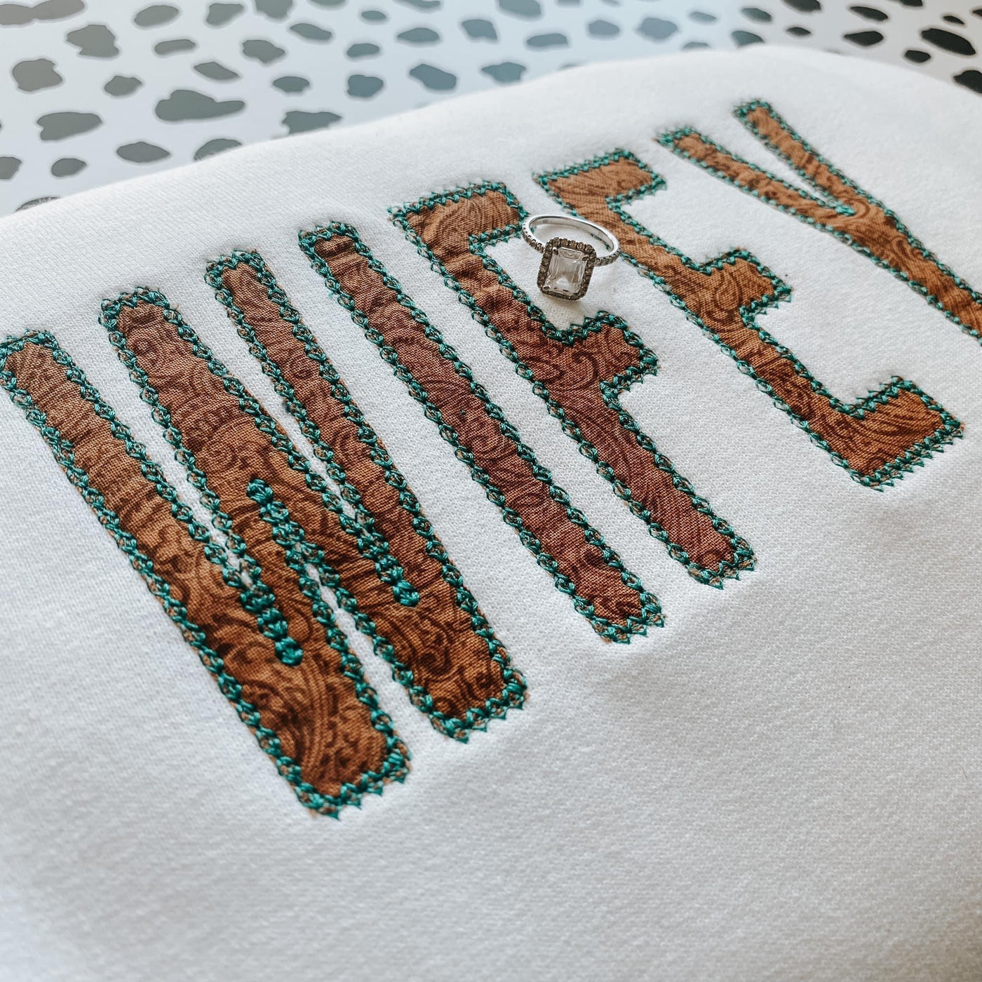 Custom word - Tooled faux leather embroidered sweatshirt